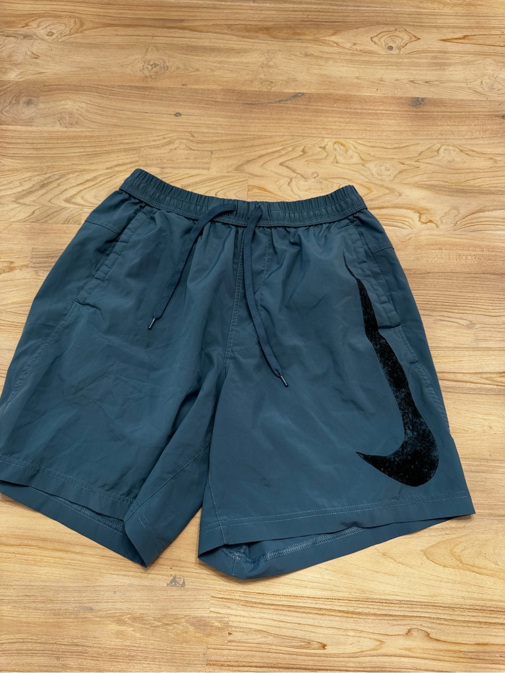 Nike Men's Teal Athletic Shorts with Big Black Swoosh